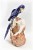 Blue Crystal Parrot on White Quartz Base. Gemstone Sculpture