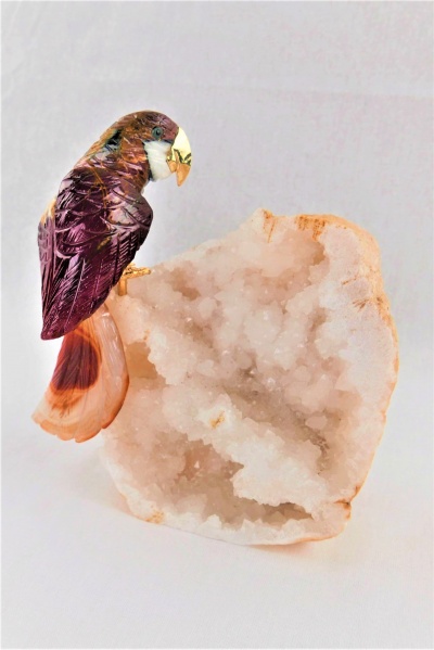 Red Crystal Parrot on White Quartz Crystal Base. Gemstone Sculpture.